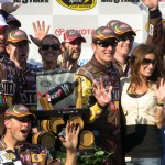 Kyle Busch and Samantha Sarcinella in Victory Lane at Infineon